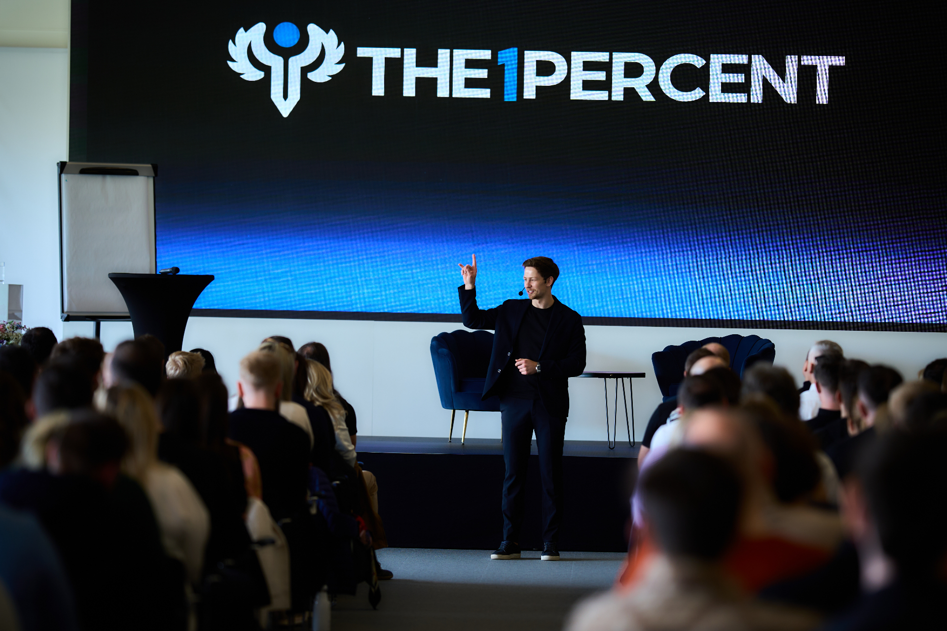 Přednáška na pódiu The One Percent